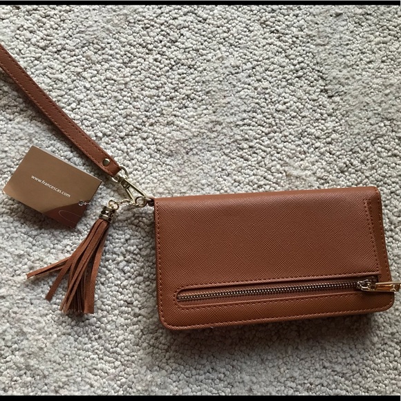 Francesca’s Handbags - Wristlet for phone from Francesca’s
